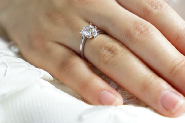 wearing 2 carat diamond engagement ring