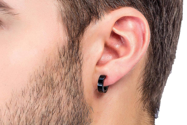 person wearing magnetic earrings